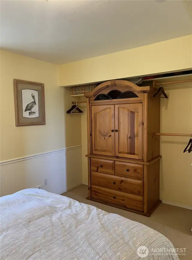 Good sized closet that comes with the armoire.