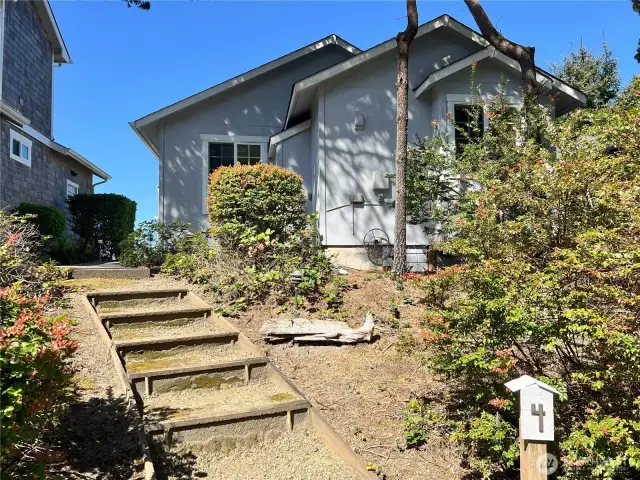 Outside entrance with parking for this unit, #4.