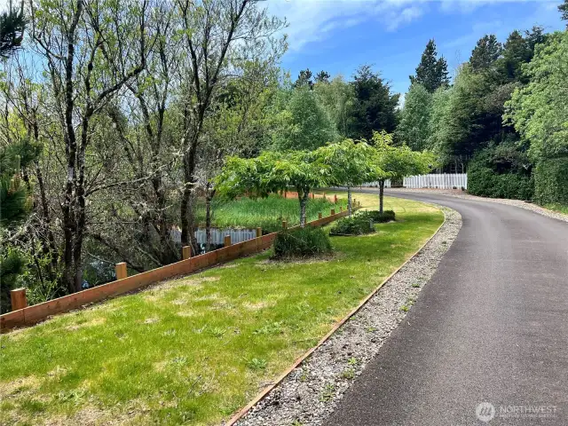 Past the gates is a pleasant drive through the property.