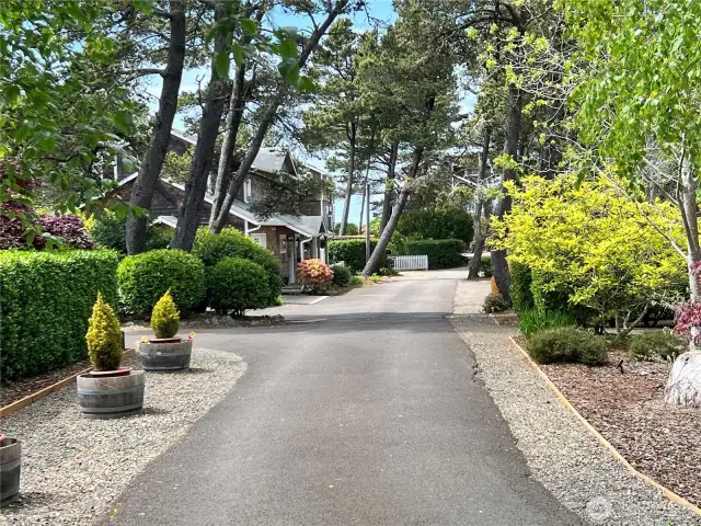 Through a beautifully landscaped community managed by the condo association.