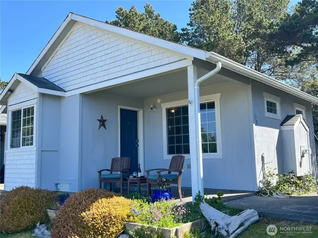 Enjoy a glass of wine on your front porch, enjoying the ocean view and fresh ocean air.