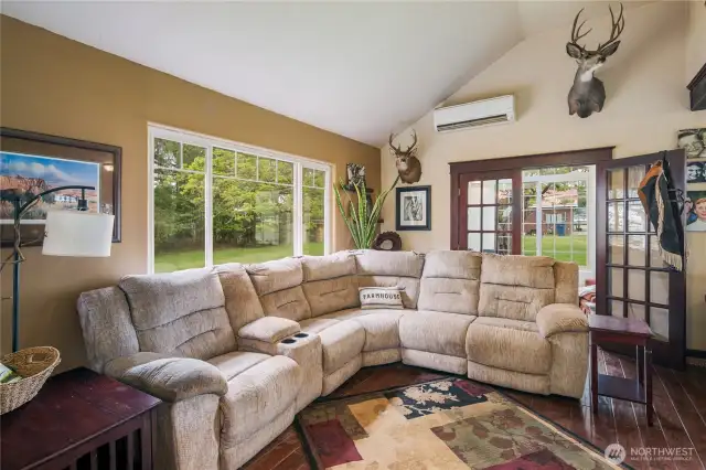 Opens to kitchen and dining area