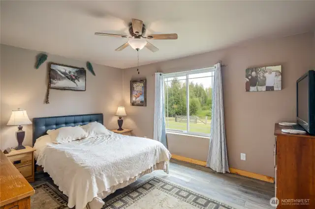 Primary bedroom overlooks back pastures