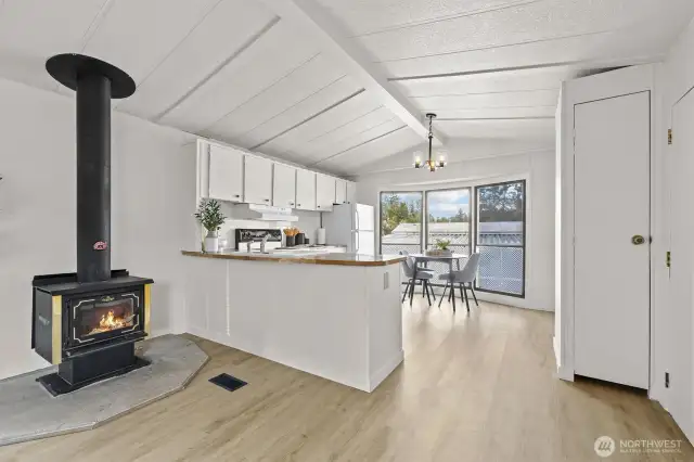 Open concept living room to kitchen offering tons of natural light.