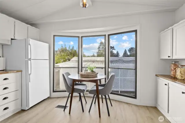 Open concept living room to kitchen offering tons of natural light.