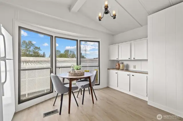 Open concept living room to kitchen offering tons of natural light.