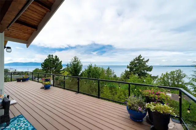 Composite Wood Deck runs the entire width of the house to take in the beautiful Bellingham Bay Views