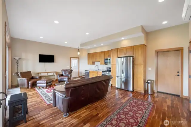 Fully permitted ADU Living room offers boasts hardwood floors, full kitchen, private entrance, 2 bedrooms and 1 bathroom.  Perfect for guests or additional income.