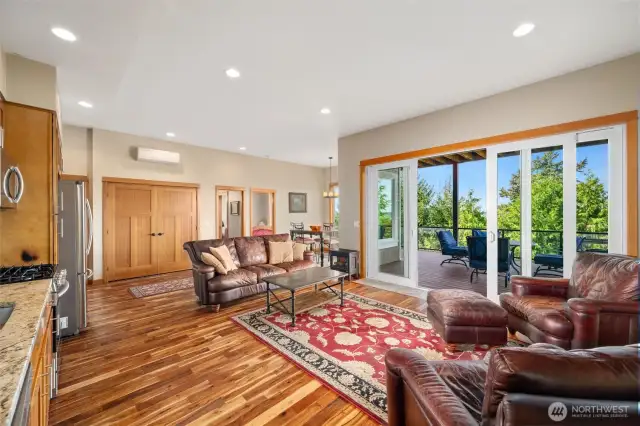 Fully permitted ADU Living room offers boasts hardwood floors, full kitchen, private entrance, 2 bedrooms and 1 bathroom