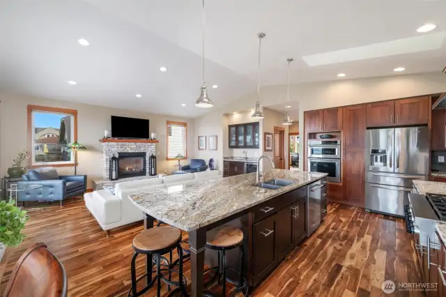 Entertainers Delight kitchen with cherry cabinetry, 2 skylights, 5 burner gas stove, granite countertops and Stainless appliances.