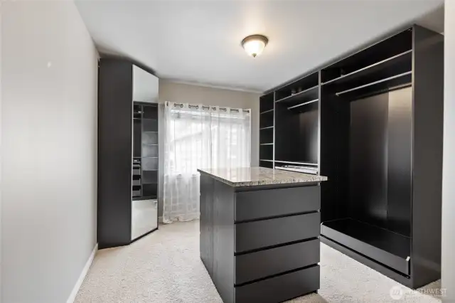 Bedroom 4 has been converted to large changing room with build in closets and chest of drawers