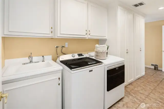 Main level Laundry/mud room leads to a 2 car garage