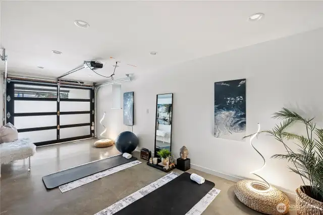 This covered parking space could be your yoga retreat or a gym, radiant floor heating