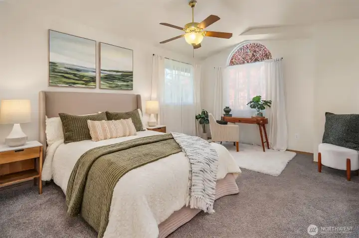 Light & bright primary suite with vaulted ceilings