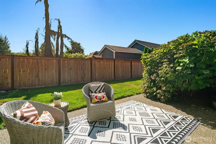 Newly installed fencing offers privacy on the patio.