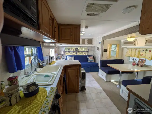 Inside the RV.  RV not included in purchase price but can be negotiated as part of sale or removed.