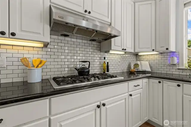 Gas Stove Top, Under Cabinet Lighting, Tile Backsplash