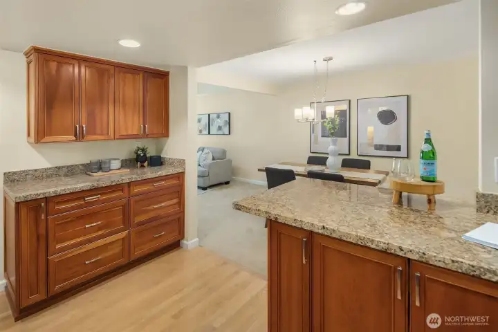 Kitchen featuring granite counters, stainless steel appliances, and plenty of cabinet space.