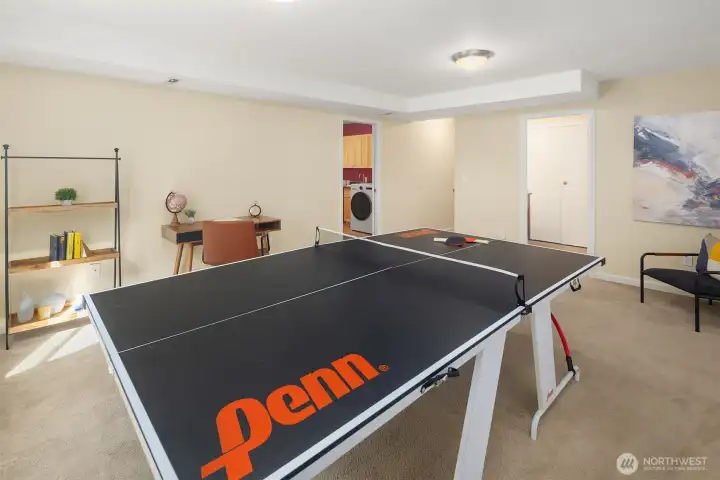 Lower level has a big rec room, large bonus room with vaulted ceilings, 3/4 bath, and large laundry room with tons of cabinet storage.