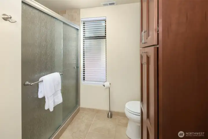 Lower level has a big rec room, large bonus room with vaulted ceilings, 3/4 bath, and large laundry room with tons of cabinet storage.