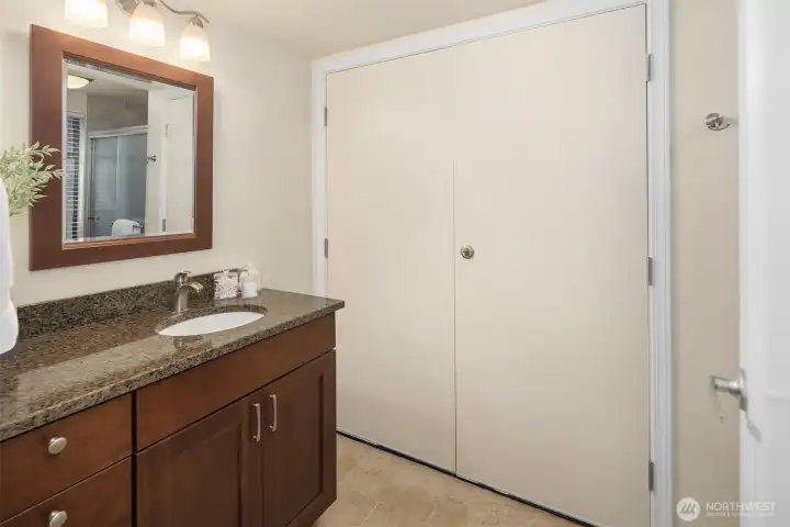 Lower level has a big rec room, large bonus room with vaulted ceilings, 3/4 bath, and large laundry room with tons of cabinet storage.