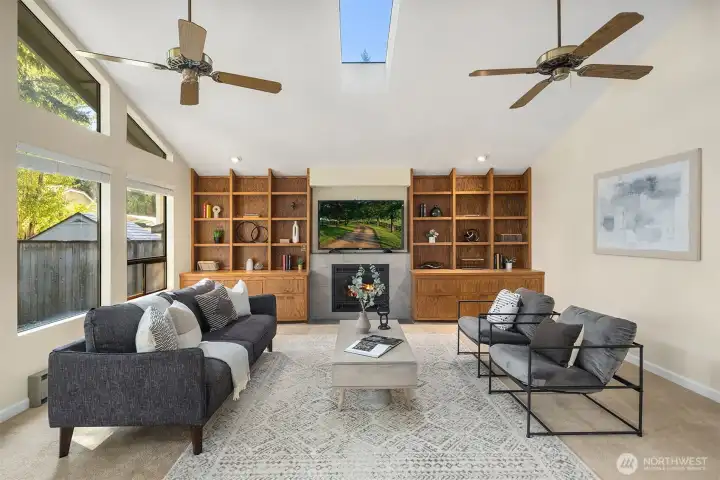 Lower level has a big rec room, large bonus room with vaulted ceilings, 3/4 bath, and large laundry room with tons of cabinet storage.