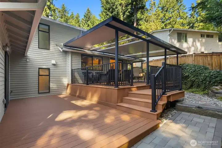 Large multi level deck with covered area great for entertaining - BBQ area is also covered.