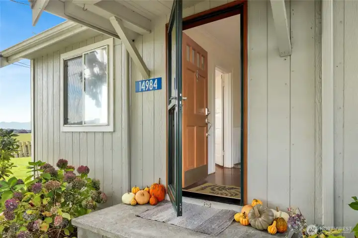 From the entryway, be greeted by modern updates and original charm
