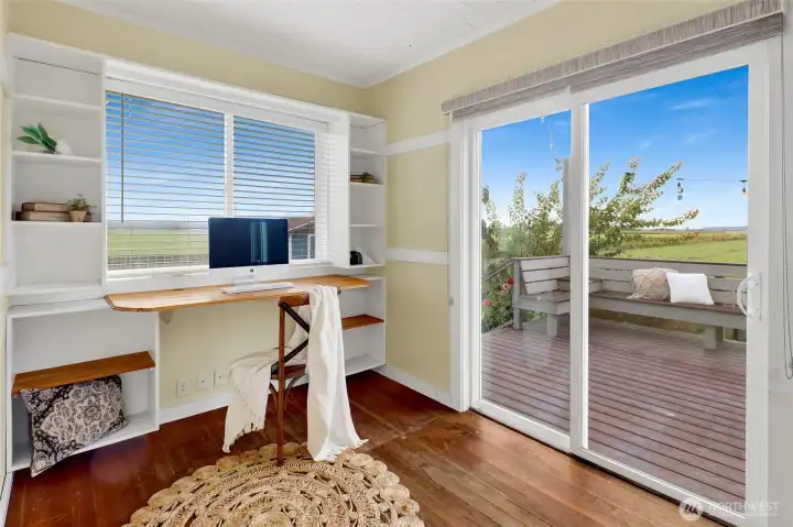 This bonus room off the new back deck could be so many things...an office, a guest space, or a famuily room