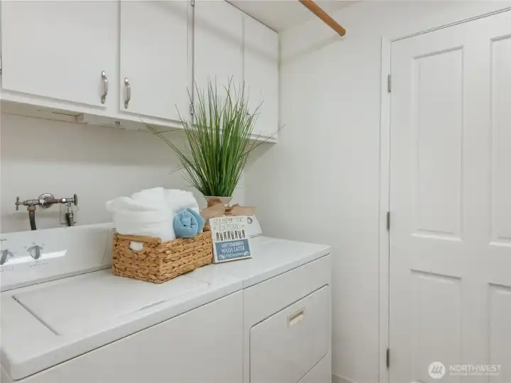 full washer & dryer with storage area!