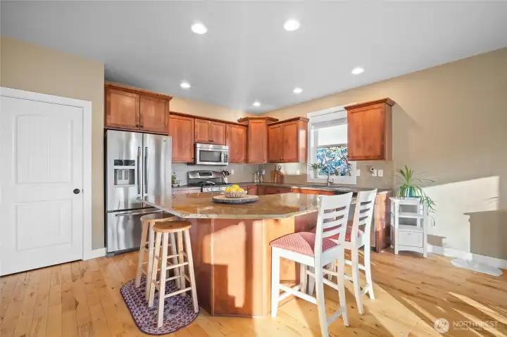 Granite Island with plenty of space for barstools.