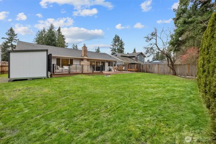 Flat and fully fenced backyard!