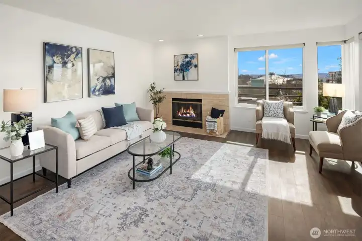 With windows on all sides, this home is full of natural light and fun views, this here is of the Climate Pledge Arena. A very quick walk!