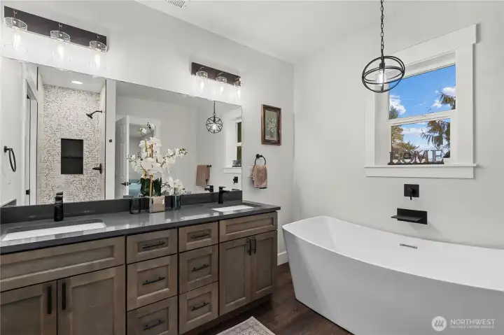 Primary En Suite 5-Piece Bath with Soaking Tub, Dual Sink Vanity w/Quartz Counters and Custom Lighting Fixtures.