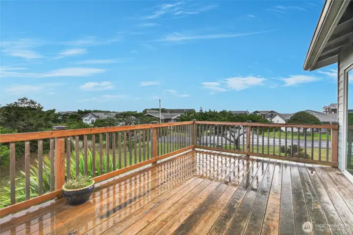 deck off great room and primary bedroom