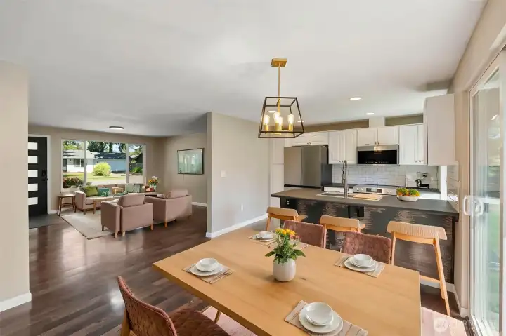 Dining area and Family Room - Virtually Stages