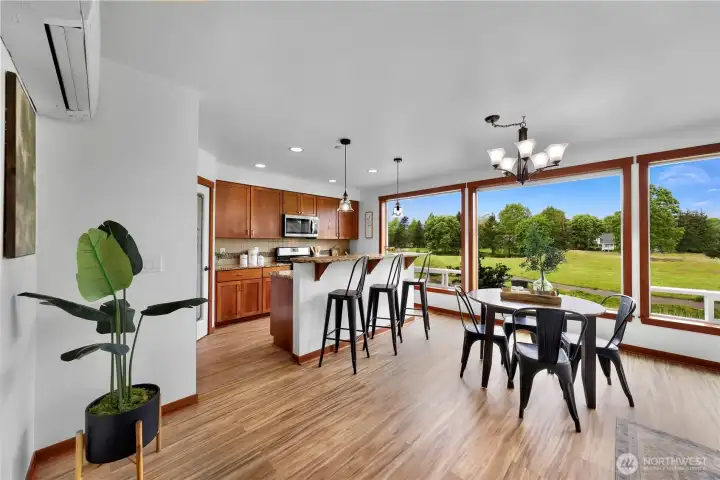 Living area with a wall of windows to enjoy the views of outside. Living area with a wall of windows to enjoy the views of outside.