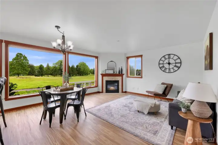 Living room with cozy corner fireplace. Living room with cozy corner fireplace.