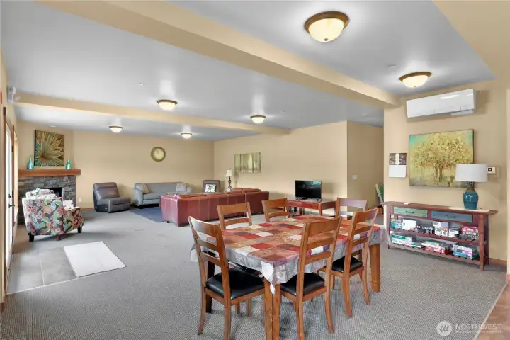 Main floor gathering room, game room, complete with kitchen and bath. Main floor gathering room, game room, complete with kitchen and bath.