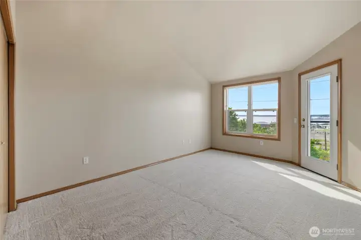 Primary suite with western views and deck access