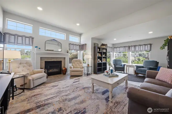 Living room with vaulted ceilings and canned lighting