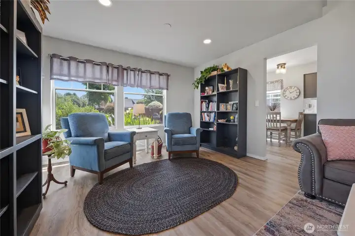 This is the formal dining room space but is used as a formal seating area.