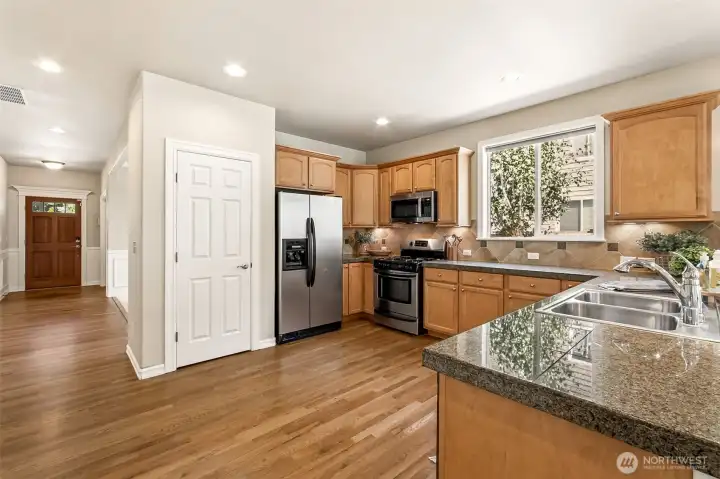 The kitchen’s proximity to the entry makes unloading groceries a breeze from either the entry door or the garage. Buyers will appreciate the efficient layout and timeless finishes. The kitchen pantry, as well as abundant cabinetry offer lots of storage to keep counters uncluttered. The kitchen’s proximity to the entry makes unloading groceries a breeze from either the entry door or the garage. Buyers will appreciate the efficient layout and timeless finishes. The kitchen pantry, as well as abundant cabinetry offer lots of storage to keep counters uncluttered.
