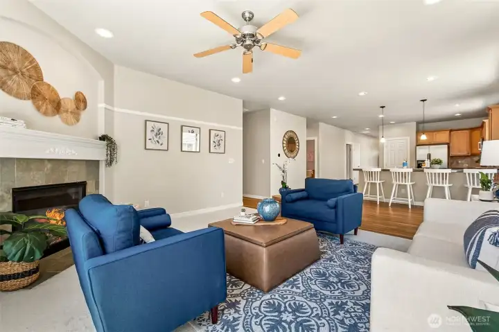 The great room enjoys soft, new carpet and a cozy gas fireplace. This move-in ready home offers style and comfort in a one level home. The great room enjoys soft, new carpet and a cozy gas fireplace. This move-in ready home offers style and comfort in a one level home.