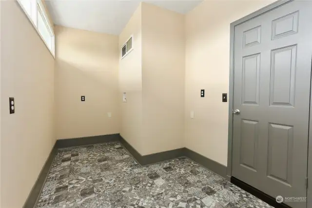 Separate entrance, potential kitchenette or 2nd laundry