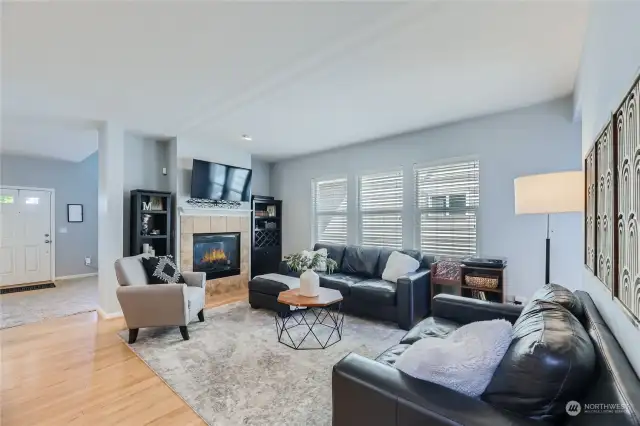 Spacious Living Area: Bright and airy with a cozy fireplace, perfect for gatherings.