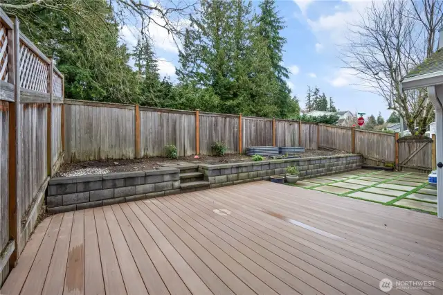 Gorgeous, private yard with huge entertainment sized deck and patio.  The yard gets East/West exposure.