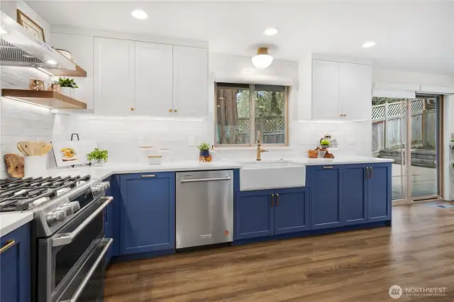 Kitchen boasts an abundance of cabinets and countertop space.