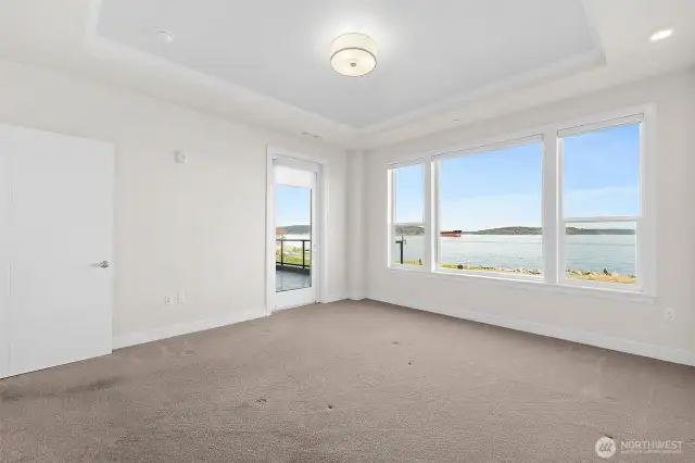 Or enjoying a morning cup of coffee right outside your primary bedroom balcony door.