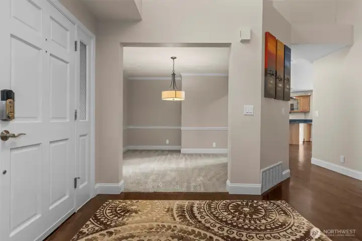 Formal dining room is to the left of the entry